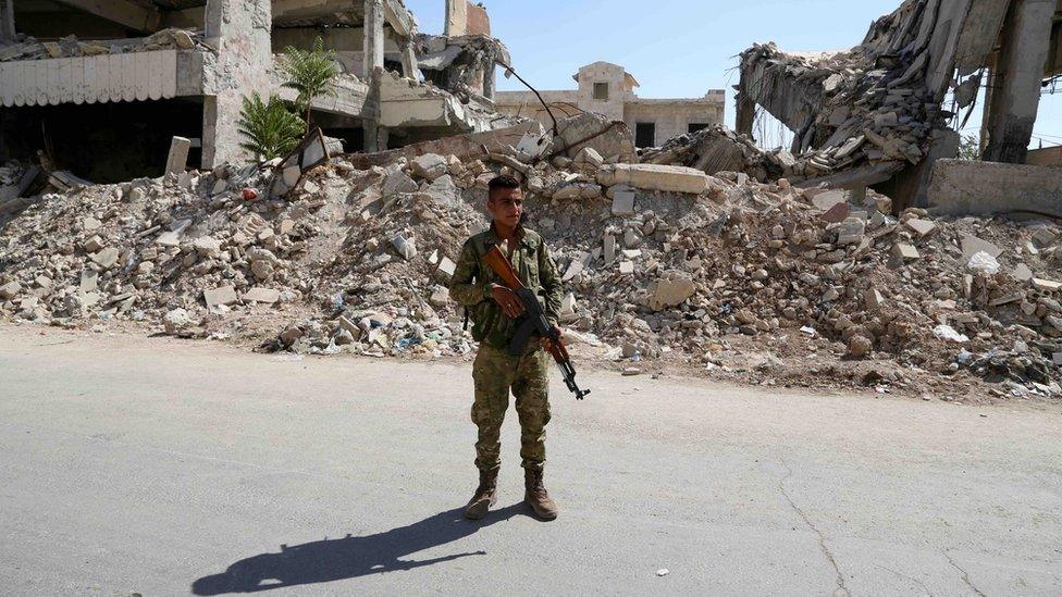 Soldier with gun in Jarablus