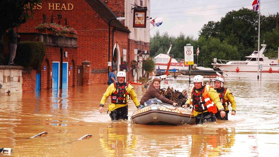 Claire Bunn being rescued on a lifeboat