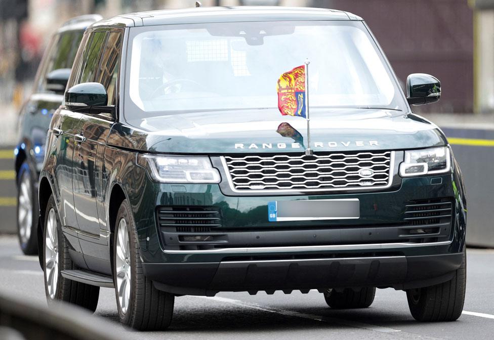 Britain's Queen Elizabeth II is driven in a Range Rover to the Houses of Parliament for the State Opening of Parliament