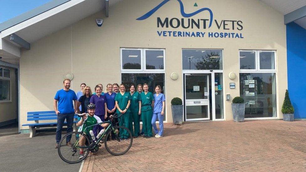 Oscar Sinfield with staff outside Mount Veterinary Hospital