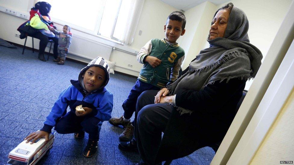 Migrants rest at a refugee centre in Heidelberg, Germany, 29 September