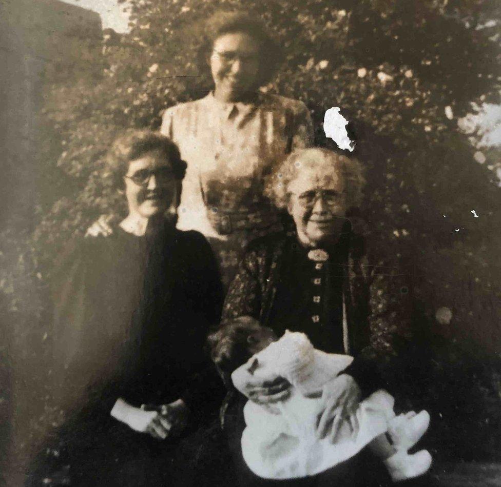 Handout photo from 1951 of Jean Thompson held by her great grandmother Mary Jane Blackmore (front right) on her 90th birthday, with her mother Mary Ann Blackmore (left) - who was gifted the chocolates in 1902 - and her grandmother Lena Milburn