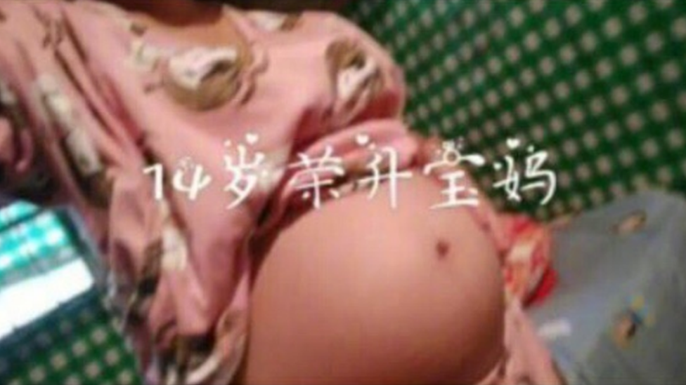 A still from a video purporting to show a pregnant teenage girl