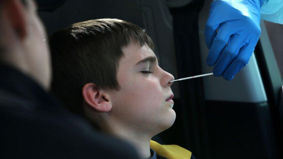 boy in Australia having coronavirus test