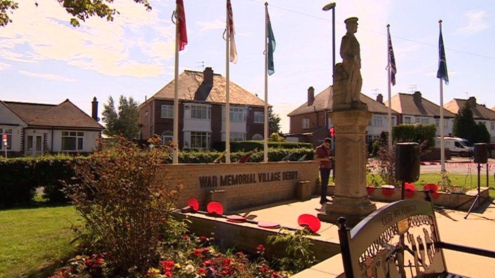 Memorial statue at the village