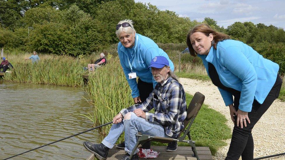 Headway staff and clients at Alvechurch Fisheries, Birmingham