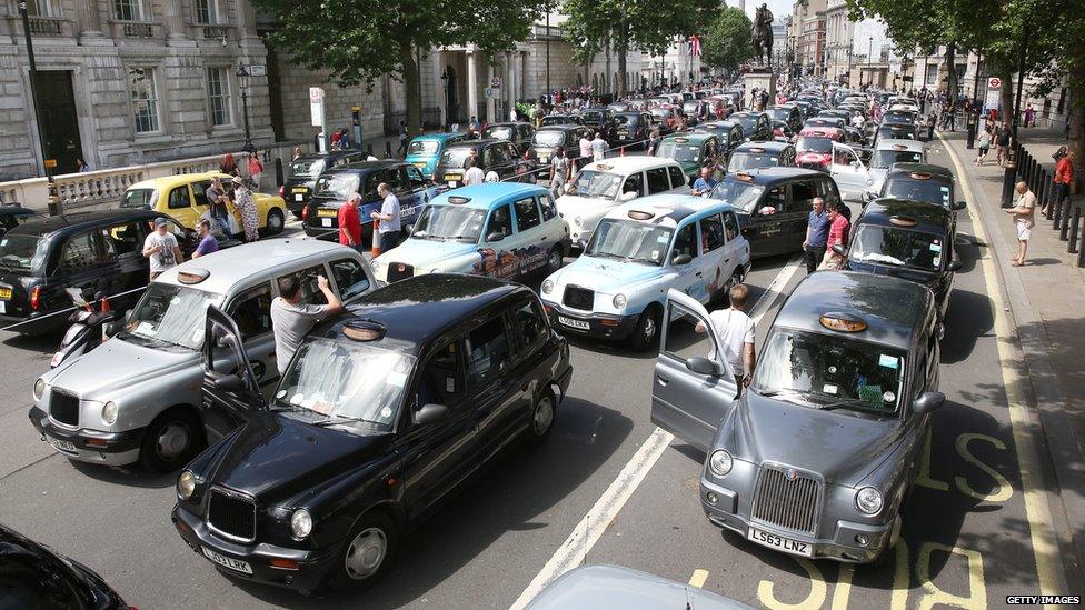 Taxi drivers protest against cab-sharing firm Uber in London