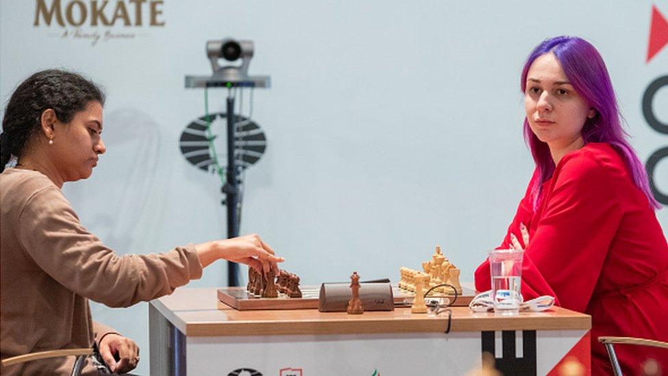 Koneru Humpy plays against Russia's Alina Bivol during the FIDE Chess World Rapid Blitz 2021 in Warsaw, Poland