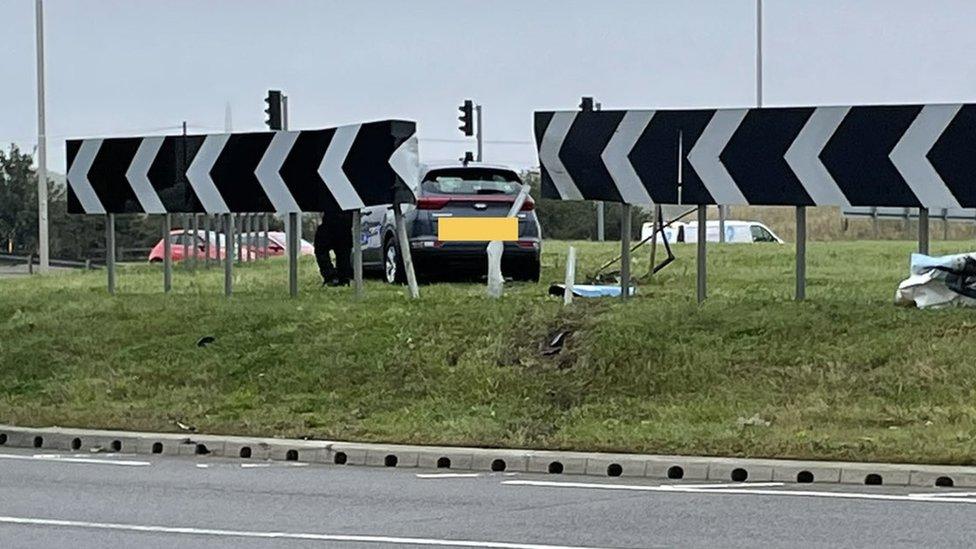 Car on roundabout