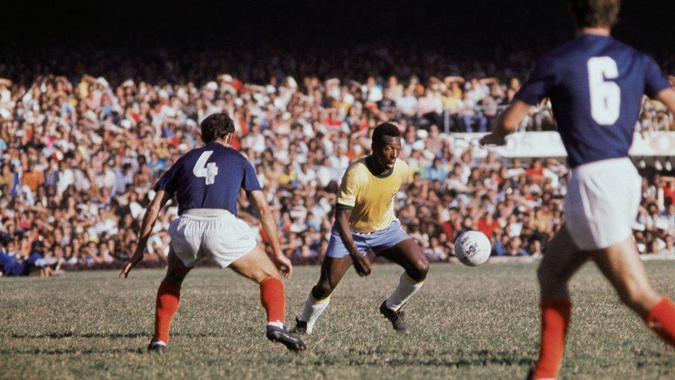 Pele playing football for Brazil