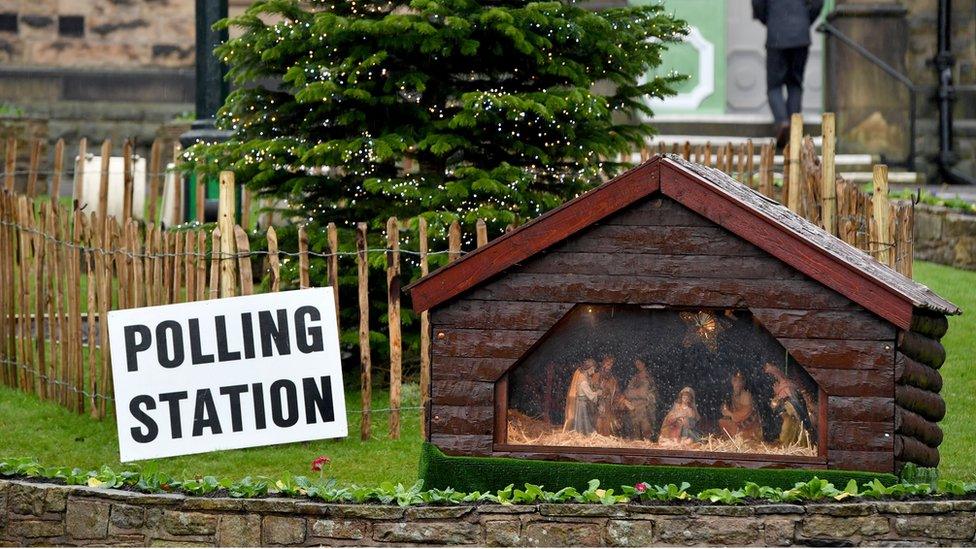 A nativity scene next to a polling station in New Mills