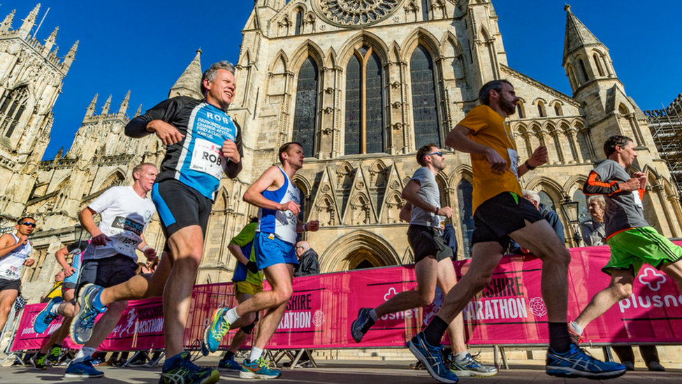 Runners pass York Minster