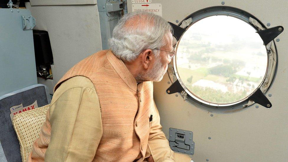 Indian Prime Minister Narendra Modi conducting aerial survey of a rain hit area in Chennai