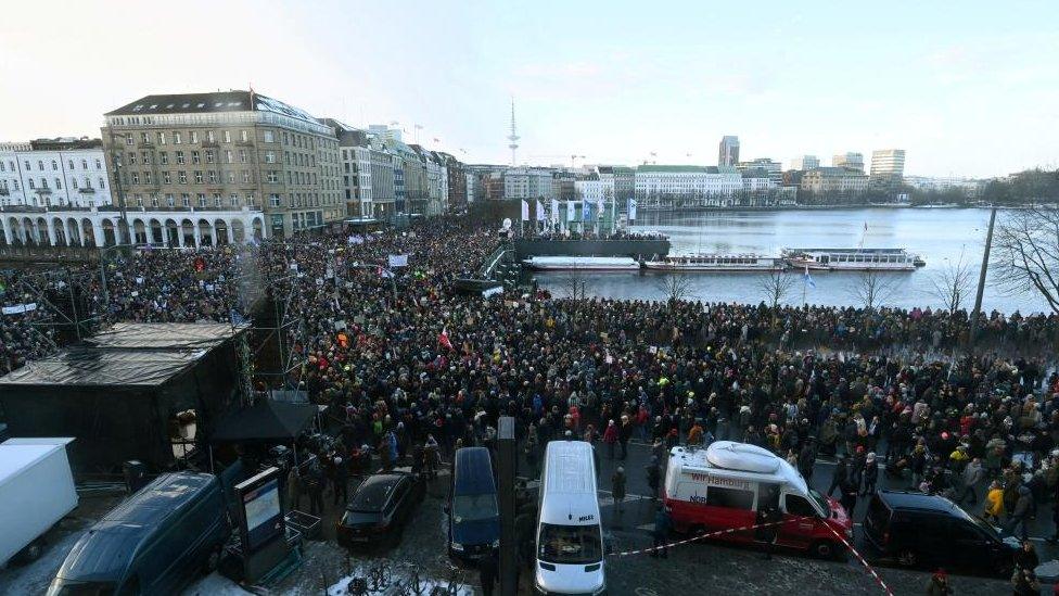 People attend a protest against the Alternative for Germany party (AFD), rightwing extremism and for the protection of the democracy in Hamburg, Germany, January 19, 2024