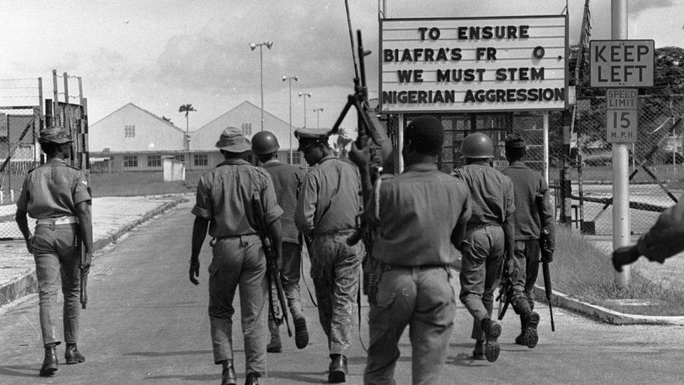 Nigerian troops entering Port Harcourt, after routing Biafran troops during the Biafran War.