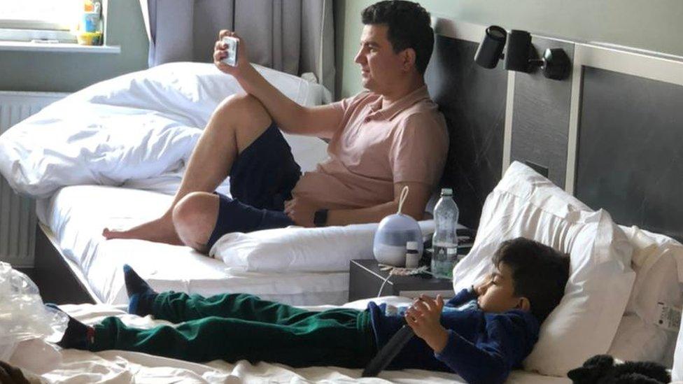 Burhan and his son Sepehr in a hotel in London