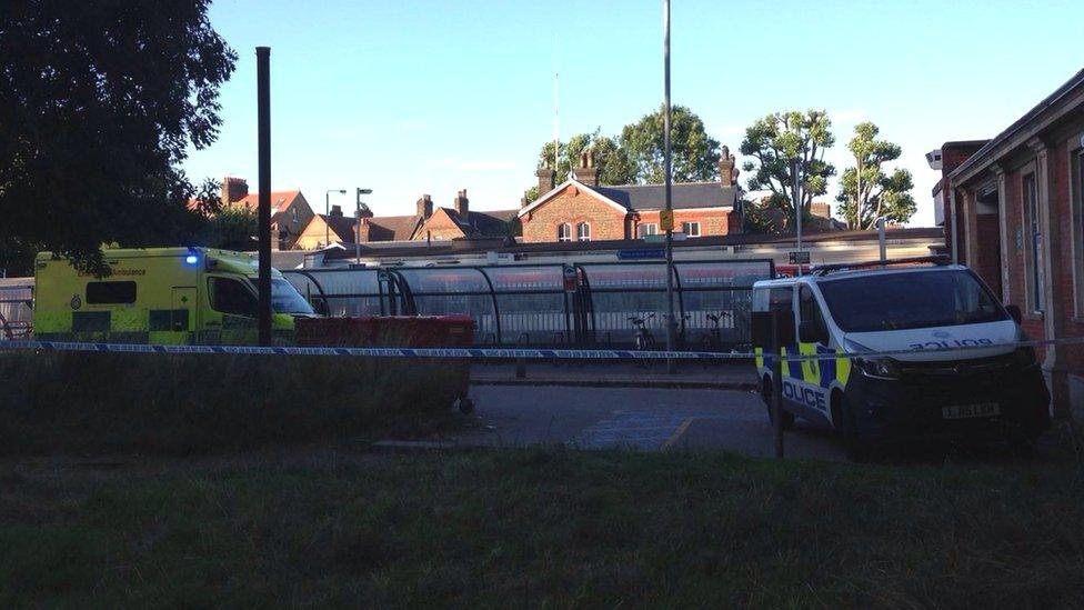 An ambulance and a police van at Wandsworth Common train station