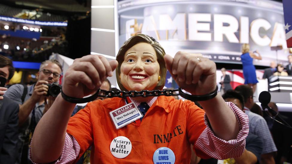 Miichigan delegate Wes Nakagiri wears a Hillary Clinton mask on the floor before the start of the final day of the 2016 Republican National Convention at Quicken Loans Arena in Cleveland, Ohio, USA, 21 July 2016