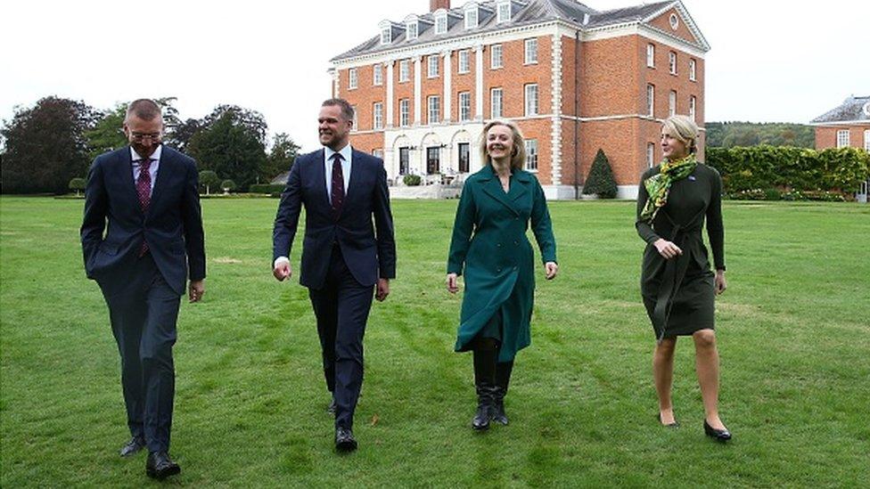 Liz Truss walks in the grounds of Chevening House