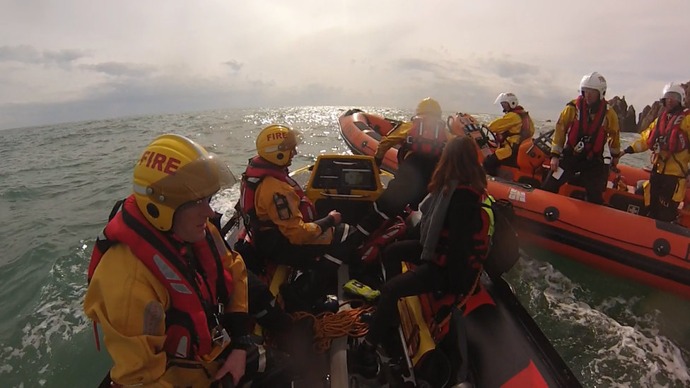 Rescue boats in the water