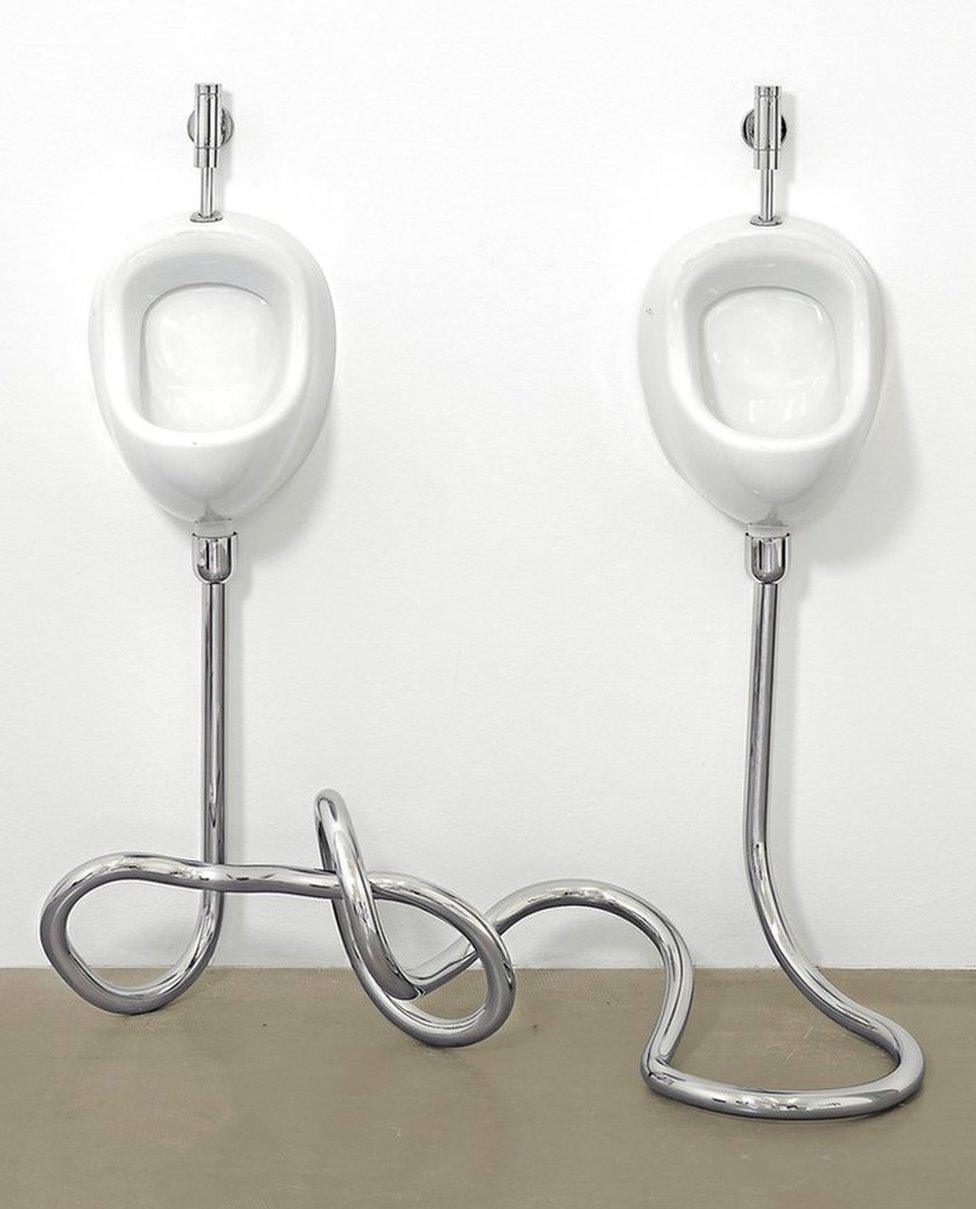 Gay Marriage (2010) consists of two wall-mounted urinals connected by twisted chrome pipes in a lovers' knot