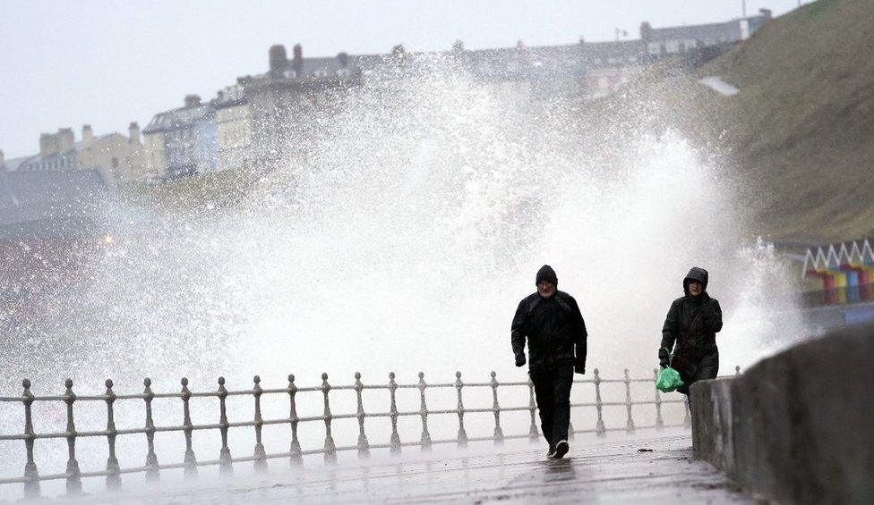 Big waves hit the sea wall at Whitby North Yorkshire