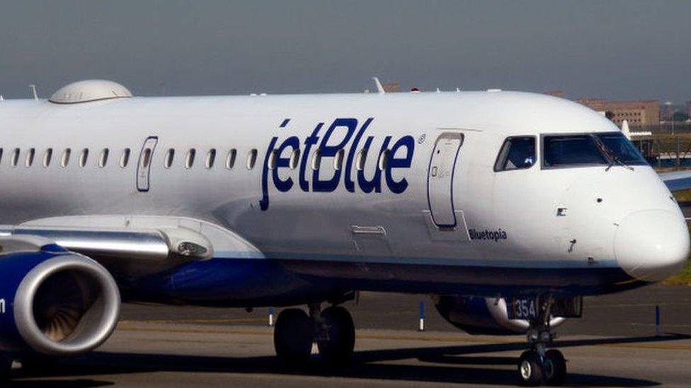 A JetBlue Embraer jet at New York's La Guardia airport