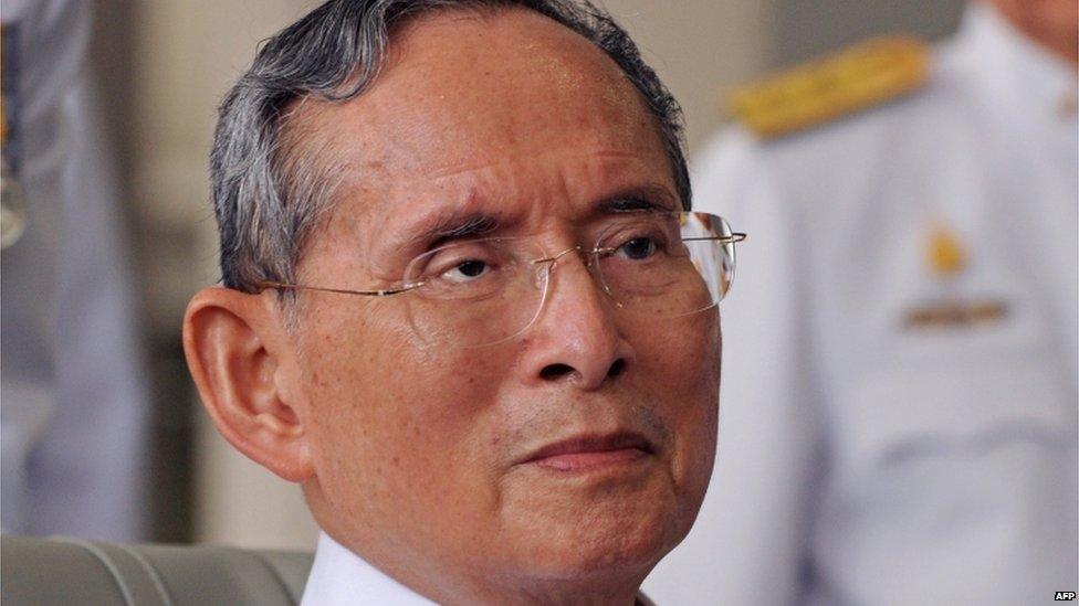 Thai King Bhumibol Adulyadej sits on wheelchair after the ceremony marking the 60th anniversary of his coronation in Bangkok on 5 May 2010