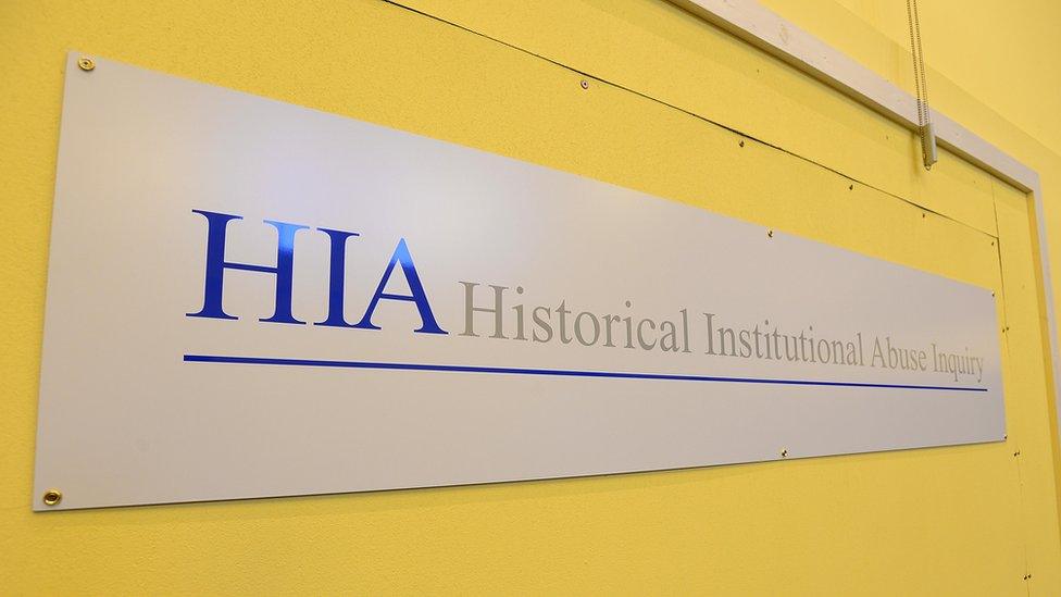 A sign that reads: HIA Historical Institutional Abuse Inquiry