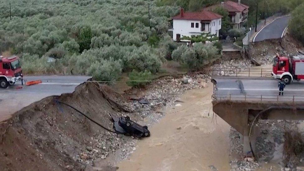 Bridge collapsed with car fallen into river below in Greece