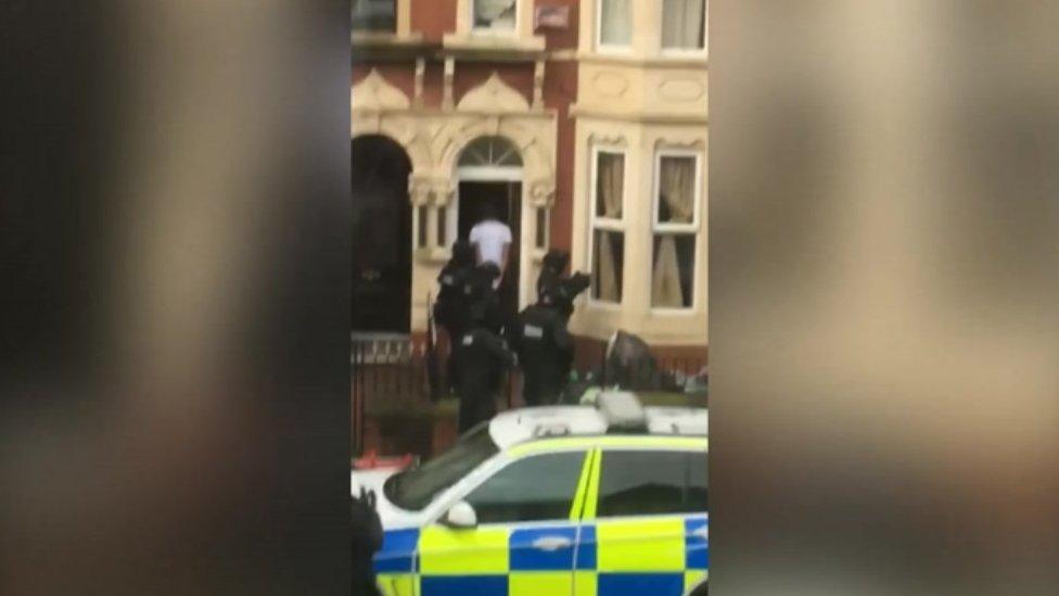 Armed police outside a house in Kimberley Road, Cardiff