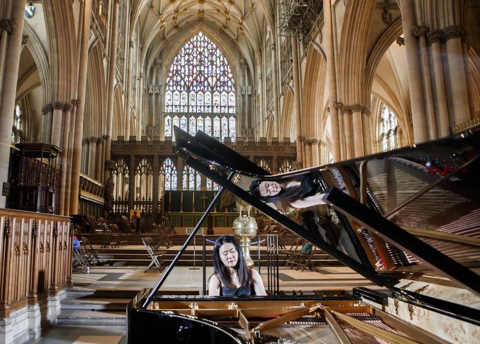 Ke Ma rehearses on a £100,000 piano at York Minster