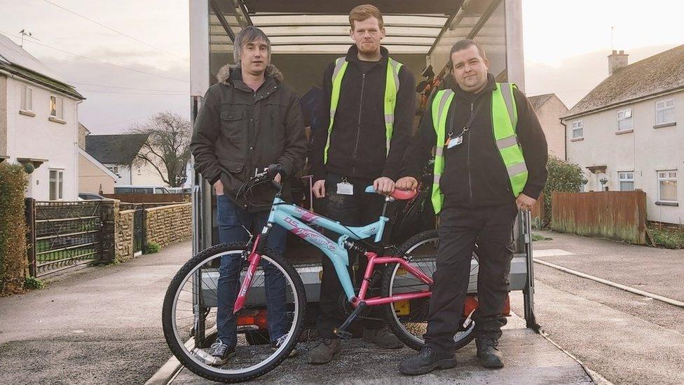 Mike Jones with two members of the Trevallis housing team