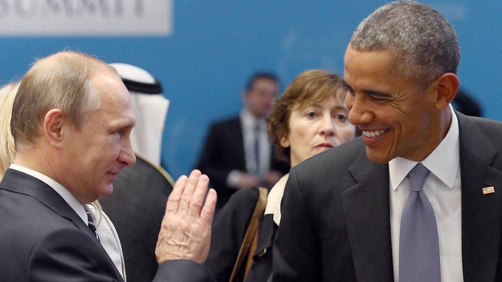 Barack Obama and Vladimir Putin talk before the second working session at the G20 Summit in the Turkish Mediterranean resort of Antalya