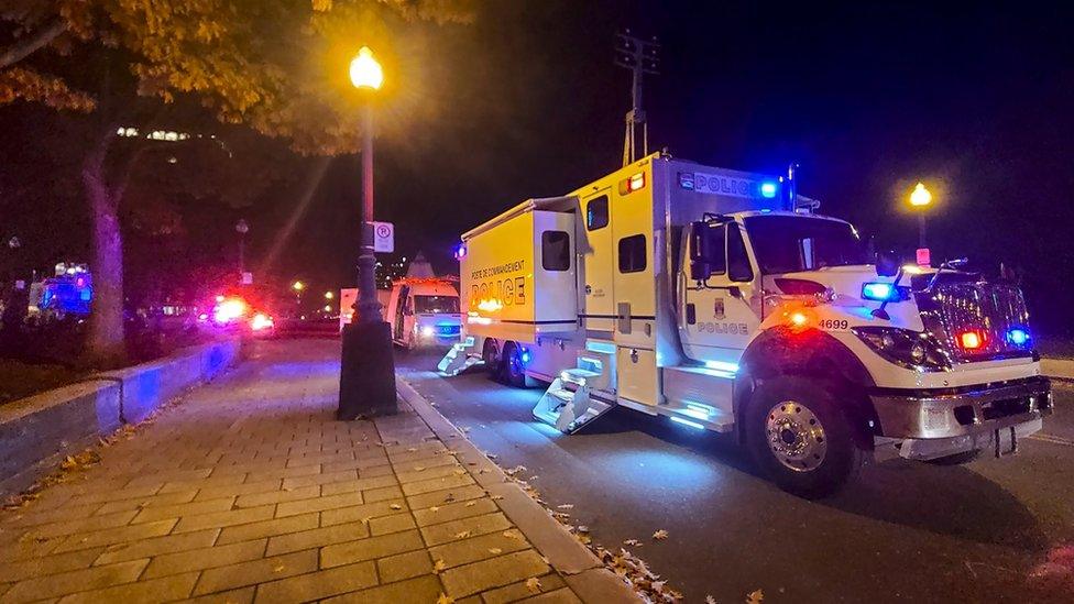 A police truck is parked near the National Assembly of Quebec, in Quebec City, early on 1 November 2020