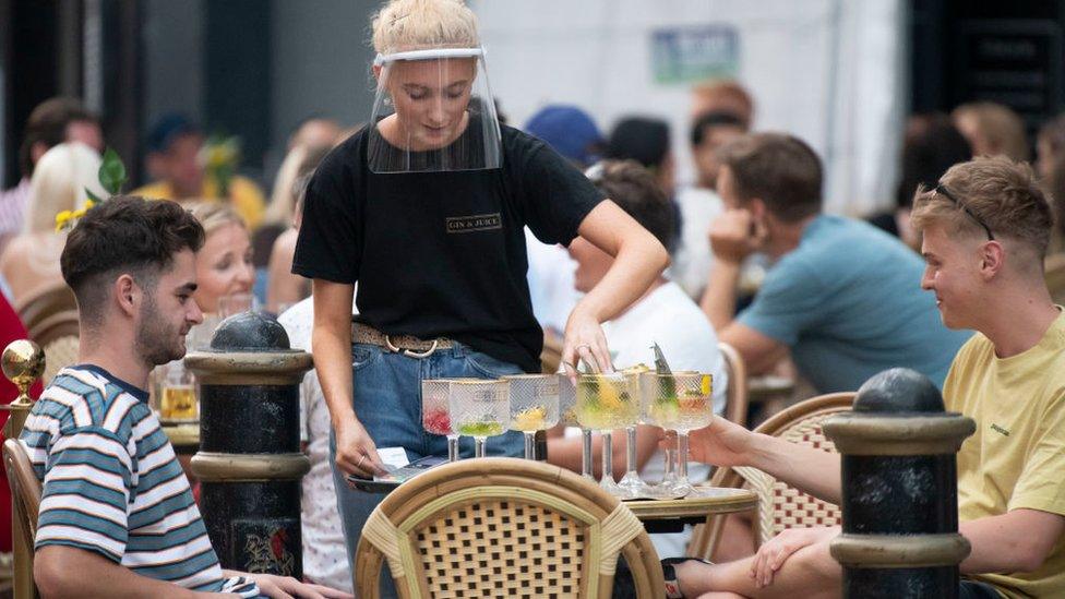 Woman serving a table