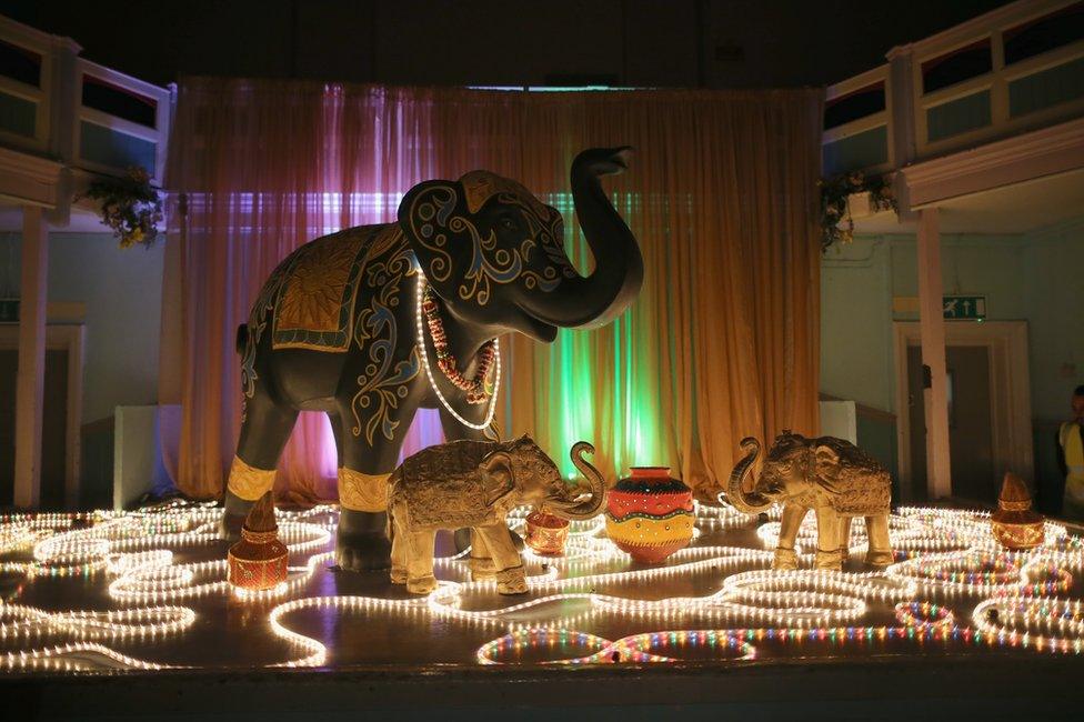 A light installation entertains crowds as they celebrate the Hindu festival of Diwali on November 11, 2015 in Leicester