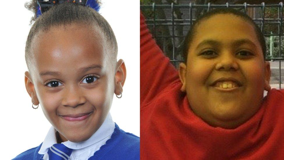 Elizabeth in school uniform and Ethan in a red jumper