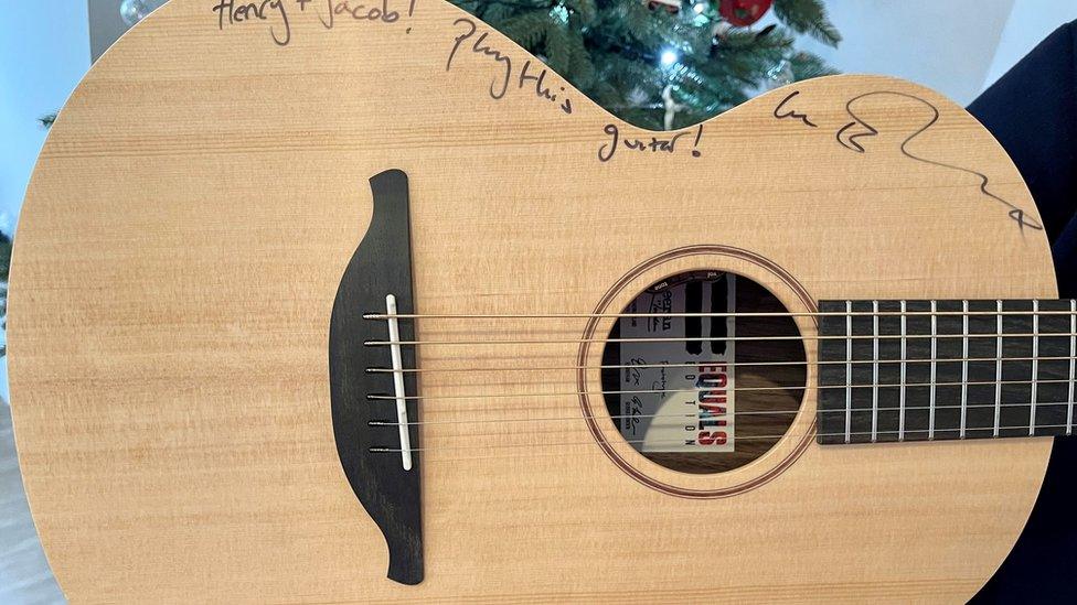 The guitar has been personalised by Ed Sheeran