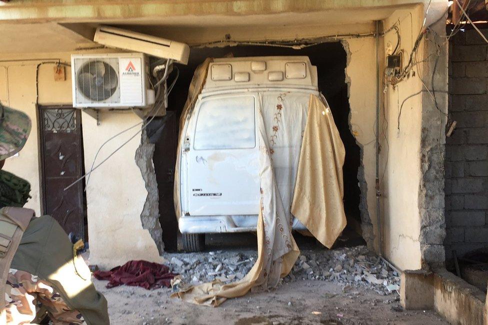 A hidden and still live car bomb found in a village home