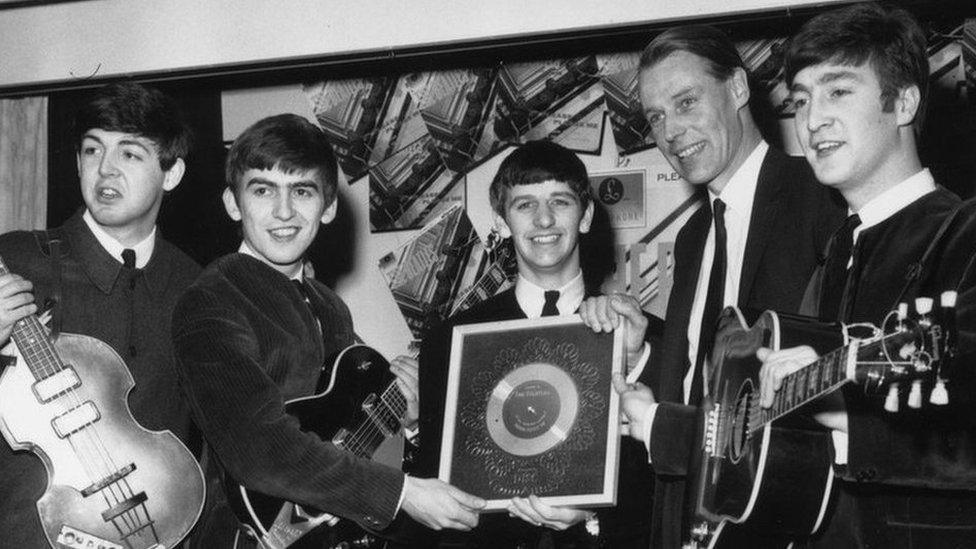 Sir George Martin with The Beatles