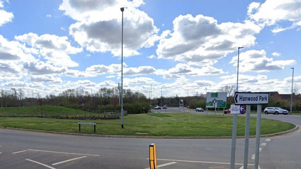 Roundabout showing sign to Hanwood Park