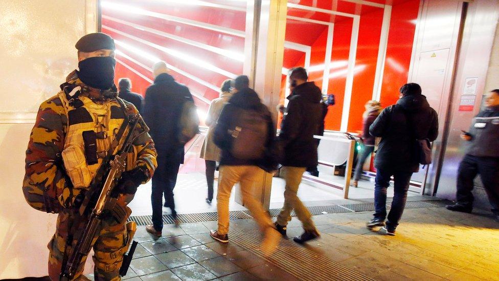 Guard at entrance to subway station in Brussels