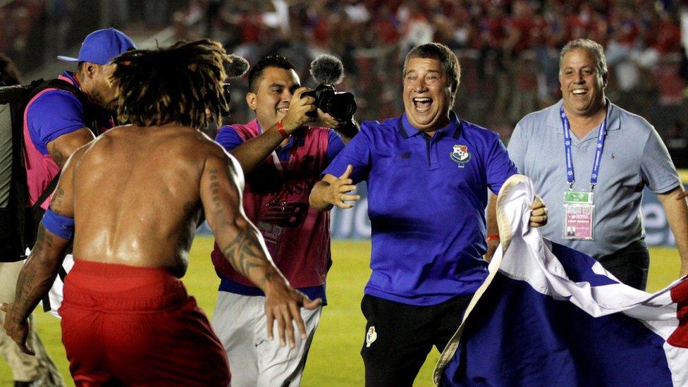 Panama's coach Dario Gomez celebrates with Roman Torres after Panama qualifies to the World Cup for the first time