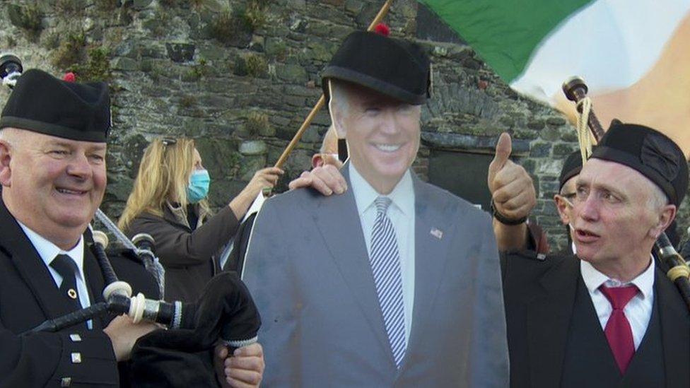 Carlingford pipe band with Joe Biden cut-out