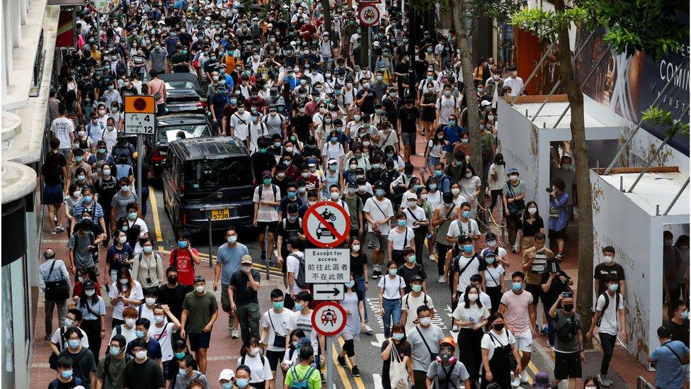 Anti-national security law protesters march at the anniversary of Hong Kong's handover to China from Britain, in Hong Kong, China July 1, 2020