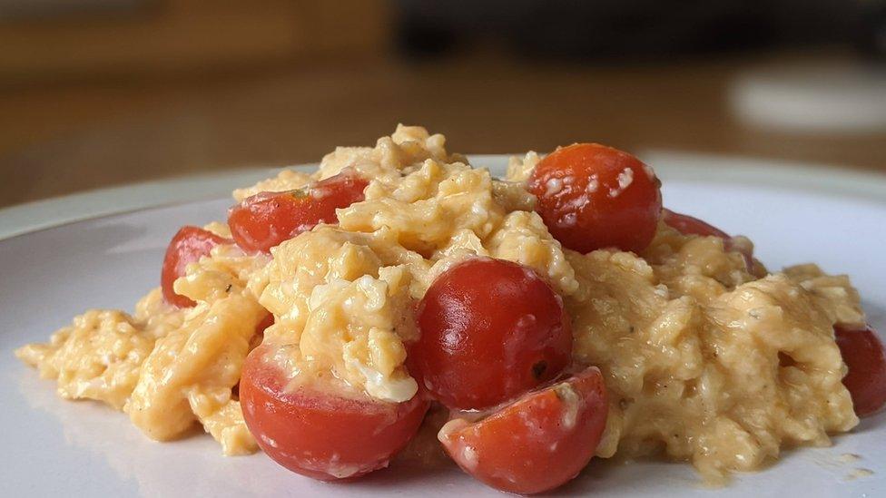 Scrambled eggs and tomatoes the robot tasted