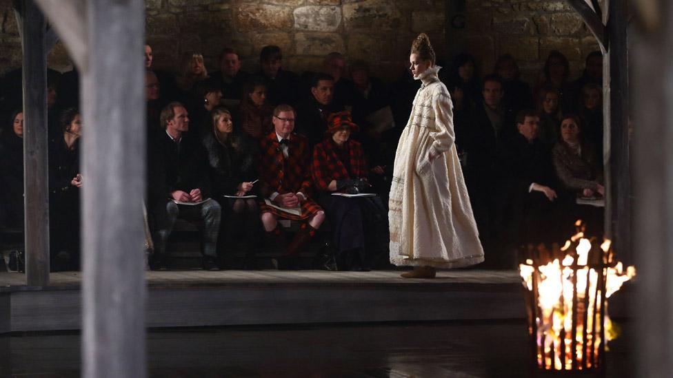 A model walks the runway at the CHANEL: Metiers d'Art fashion show at Linlithgow Palace on December 4, 2012 in Linlithgow, Scotland