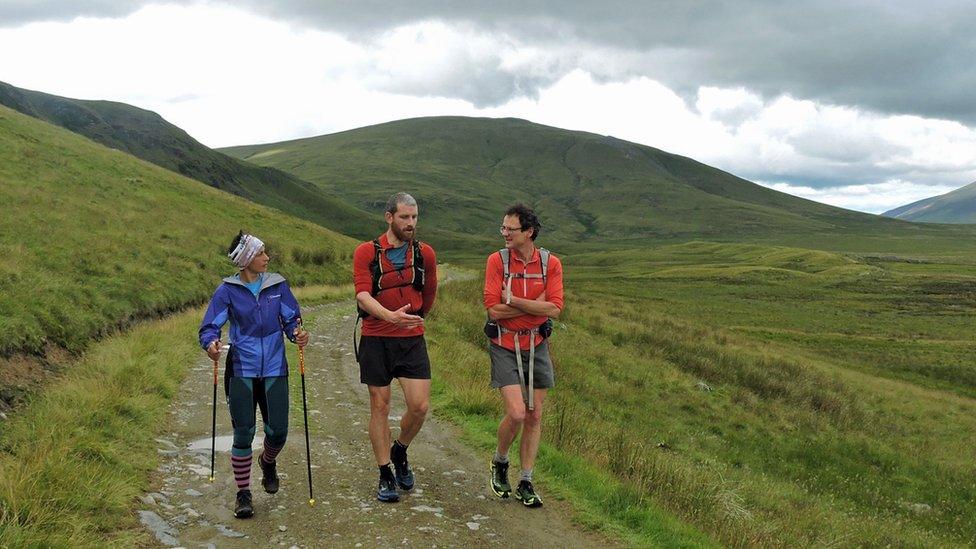 Sabrina Verjee walks alongside Paul Tierney (centre) and Steve Birkinshaw