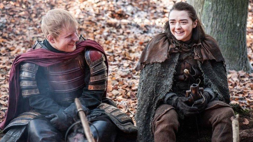 Undated handout photo issued by HBO of Ed Sheeran staring in the TV drama Game of Thrones, alongside Maisie Williams who plays Arya Stark.